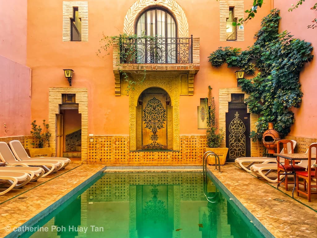 Sunlit courtyard of a traditional riad in Marrakech